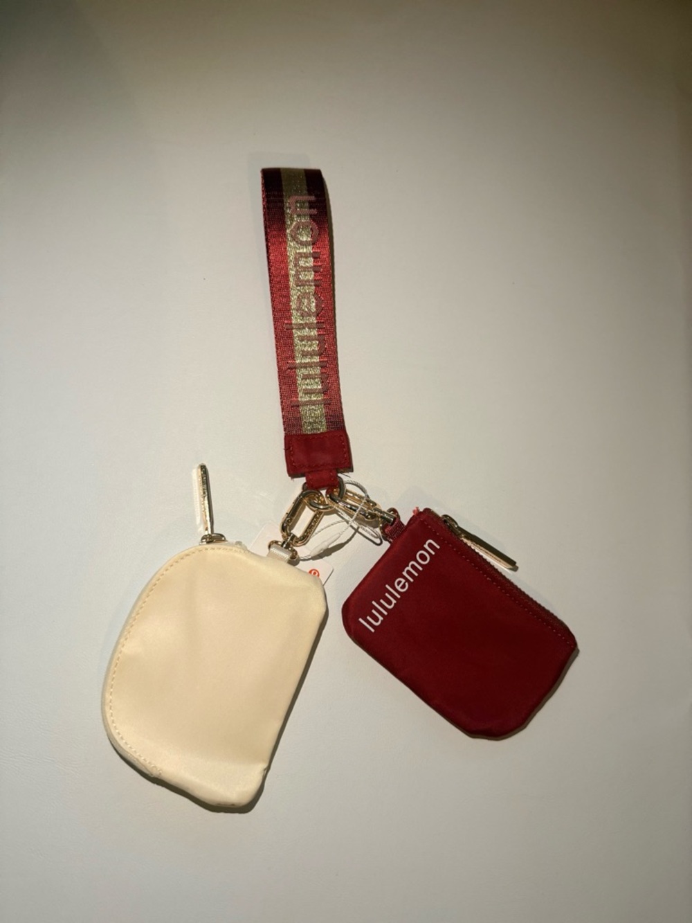 lululemon athletica Red and Cream Key Pouch Set with Branded Strap
